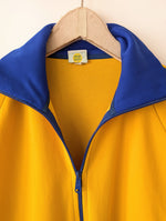 Lade das Bild in den Galerie-Viewer, Trainingsjacke 70s Grasshoppers Senfgelb Blau (L)
