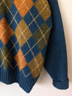 Lade das Bild in den Galerie-Viewer, *Wolle* Pullover Rauten Strickmuster Petrol (L-XL)
